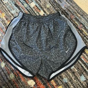 Grey and black Nike athletic shorts